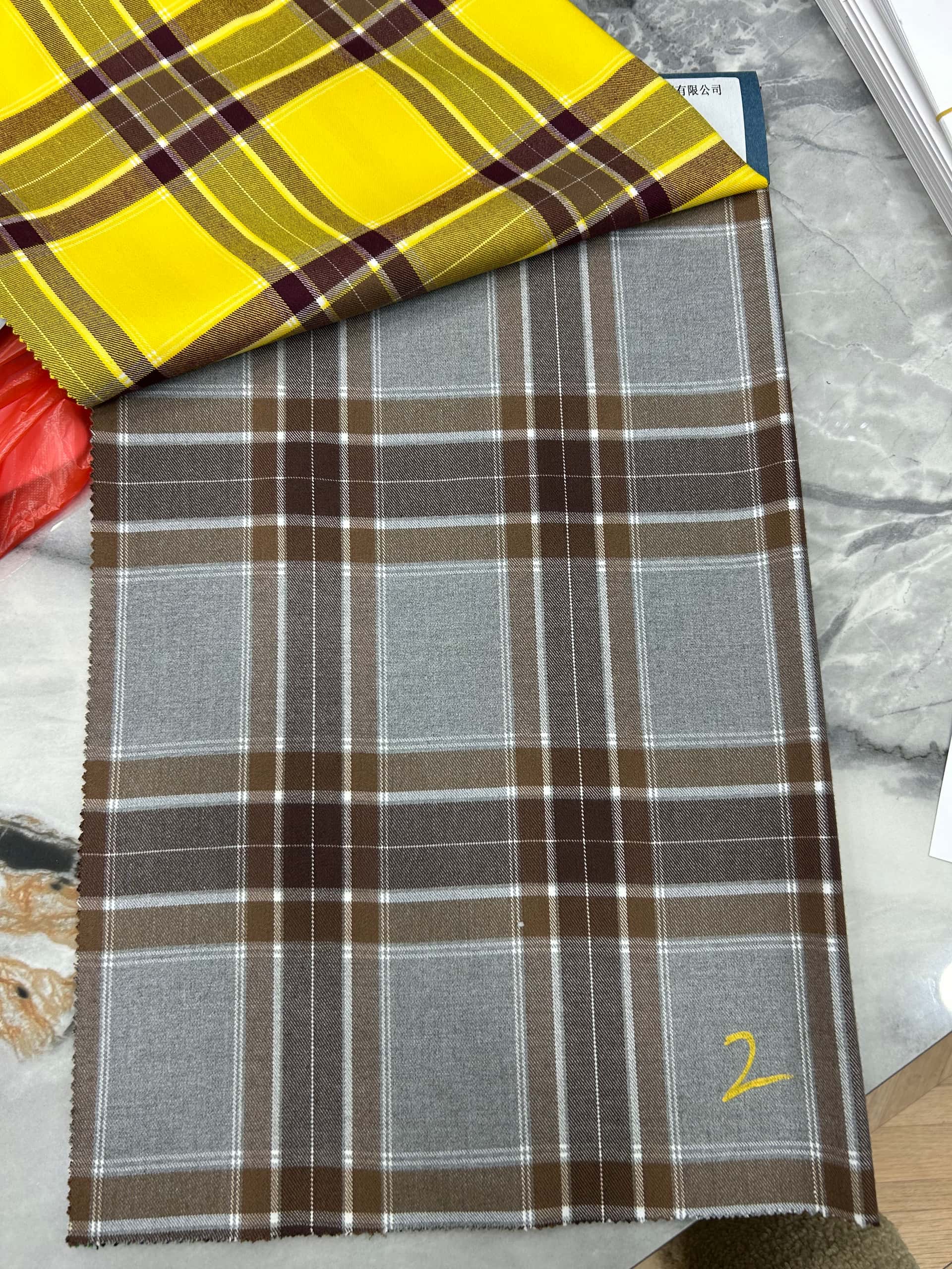 Checked wool suiting — fabric developed by Belleza