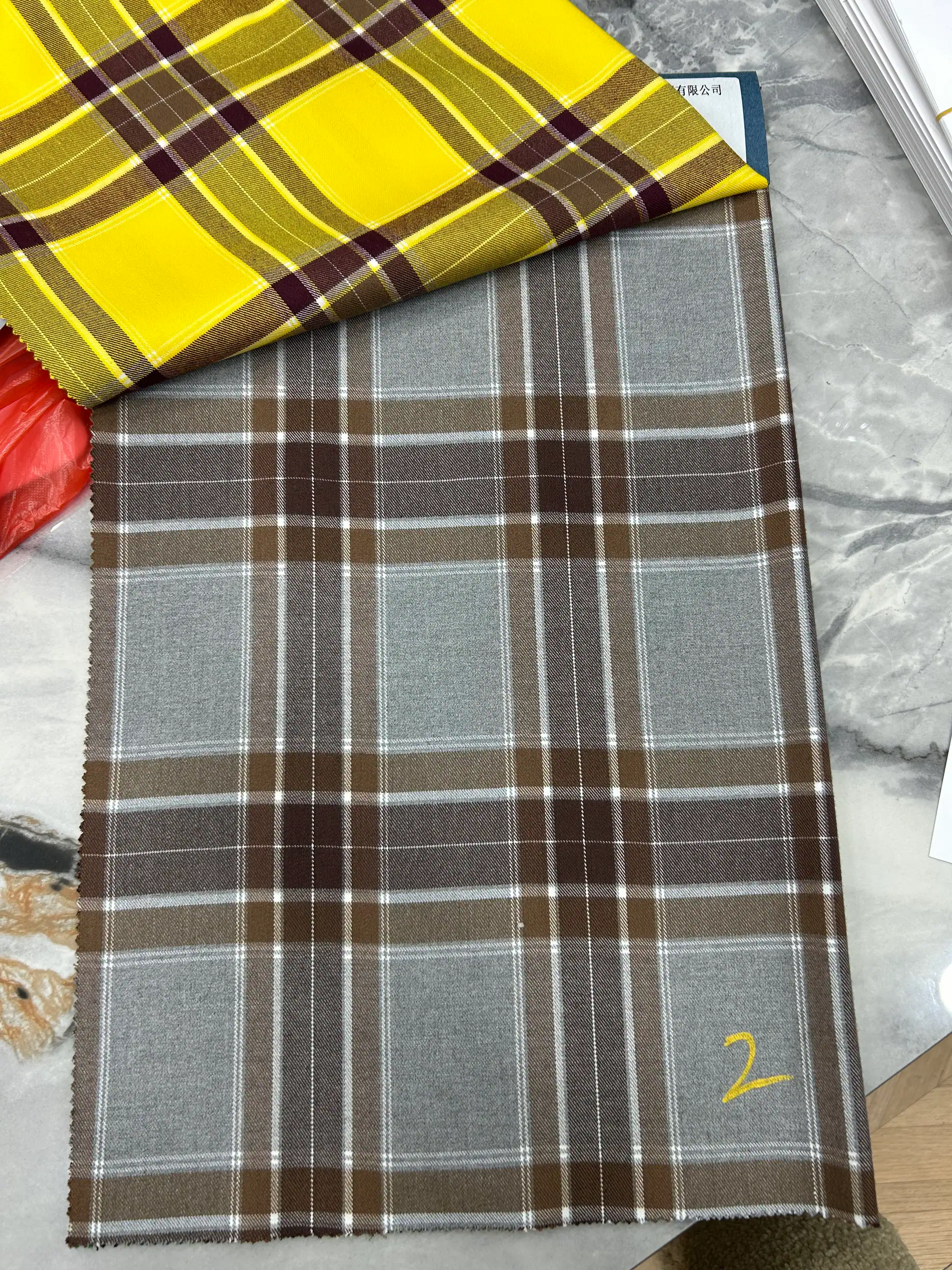Checked wool suiting — fabric developed by Belleza