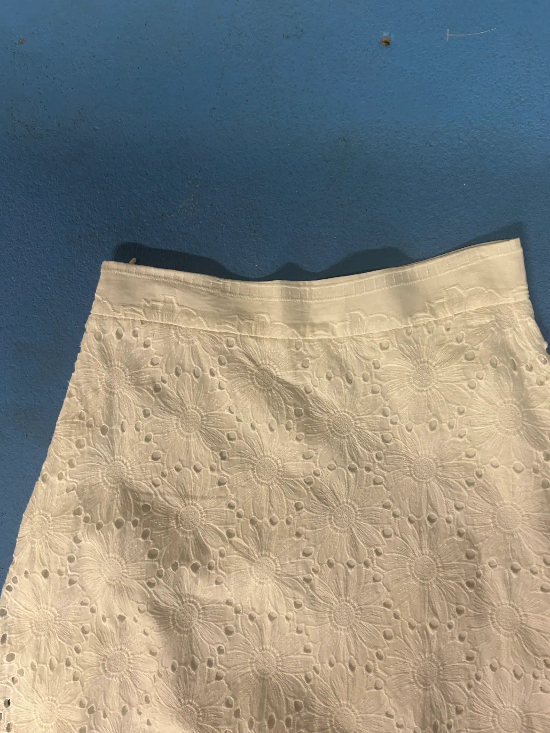 Cream eyelet — fabric developed by Belleza