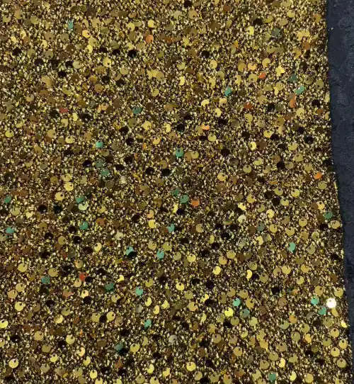 Gold sequin ground — fabric developed by Belleza